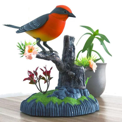 🎶✨ 50% KORTING! Stop met saaie decoratie! Dé spraakgestuurde zangvogel tjilpt en beweegt zodra hij geluid hoort – brengt de natuur tot leven op je bureau of boekenplank!