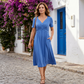 👗💙 50% KORTING! Alsof je een zomerbries in een jurk giet die je taille accentueert en je benen laat dansen! V-hals, korte mouwen, lange pasvorm – klaar voor strand, stad of terras.
