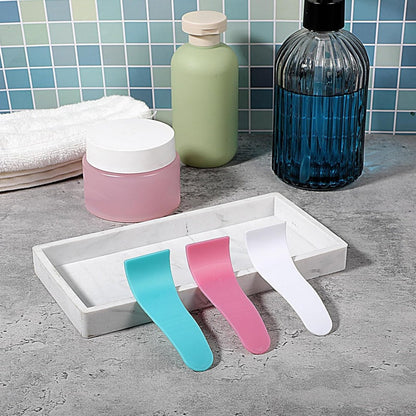 Ergonomische schraper-spatel voor ontharing