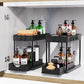 🛁➡️👑 50% KORTING! Stop met het zoeken naar dat ene flesje achterin je badkamerkastje! Deze schuifbare organizer met 2 lagen en valbeveiliging schuift alles naar je toe – alsof je een mini-supermarkt onder je wasbak hebt!