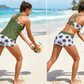 👙✨ 50% KORTING! Tanktop, bikinitop én shorts in 1 set. Criss-cross rug, tummy control, en sneldrogende stof – jij bepaalt hoe je straalt op het strand!
