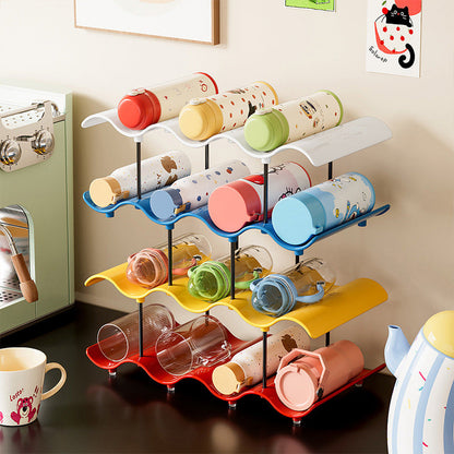 🥂💥 50% KORTING! Stop met het stapelen van mokken alsof het een instortende toren is! Deze wave-organizer met antislipvoetjes zet álles rechtop en binnen handbereik – 2, 3 of 4 lagen, jij kiest.